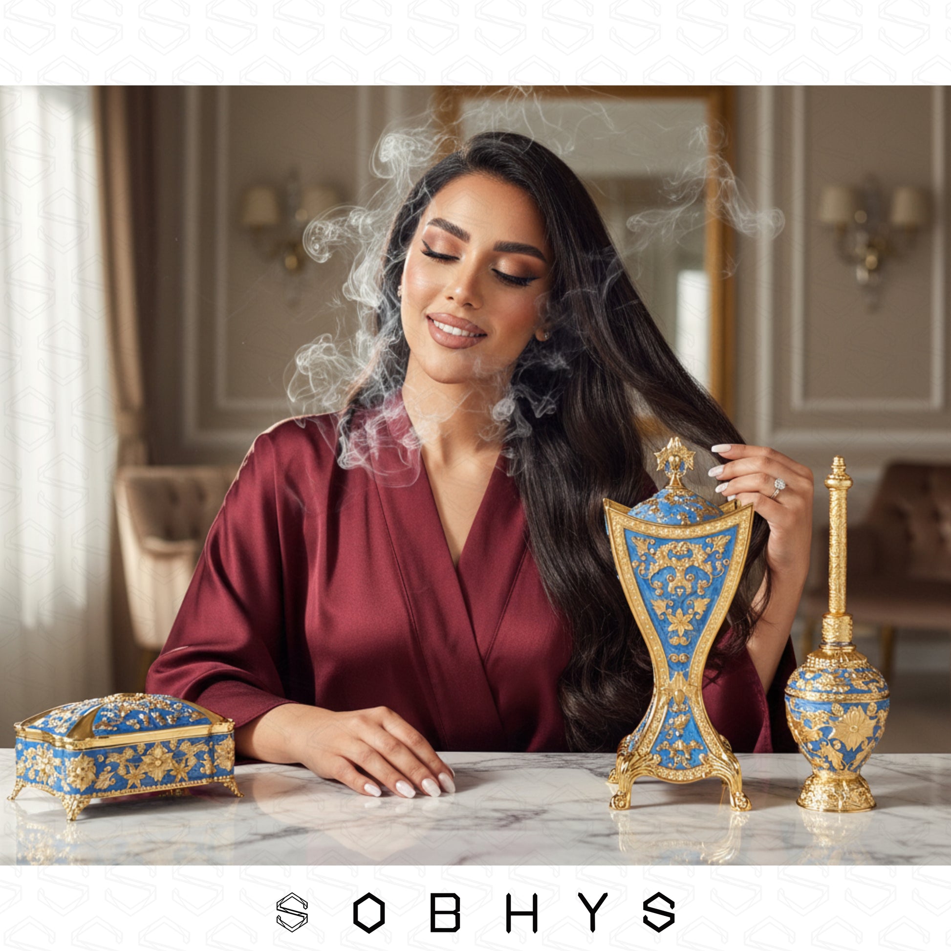 Luxury Mabkhara incense burner ornate base Royal Blue Gold UAE gift
Woman with decorative items on a table, featuring the Sobhys brand.